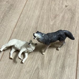 2 Wolf Figurines Good Condition Used